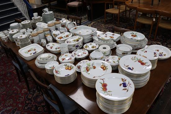 A very extensive Royal Worcester Evesham oven proof service of fruit decorated ware and tureens and other items